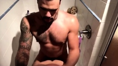 Guys fuck in the shower after gym