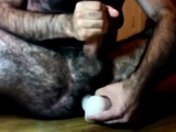 Hairy guy and his dildo