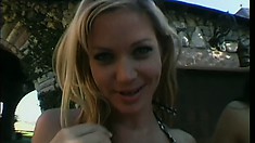 In the outdoors, two magnificent pornstars with big boobs fuck a stiff cock