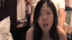Asian teen girl on her webcam chat