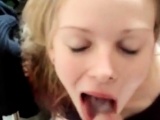 Shooting cum on the cute blonde's tongue and she swallows